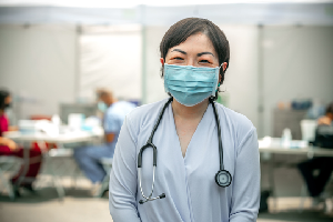 young woman wearing ppe mask